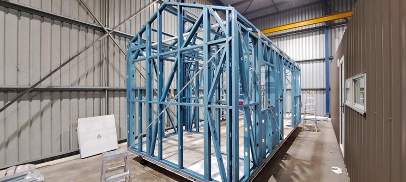 home being build in the warehouse